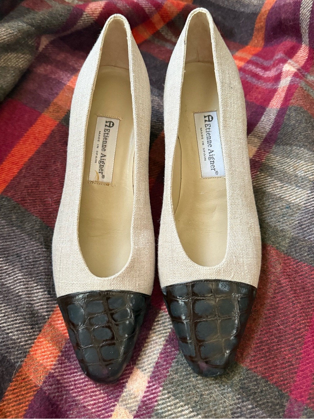 vintage Etienne Aigner cap-toe heels feature a beige fabric upper and a distinct